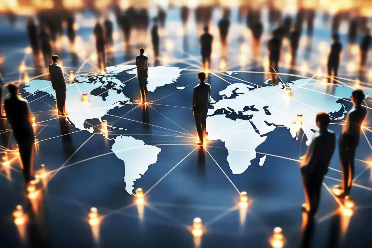 Silhouetted business figures standing on a stylized world map connected by glowing lines and dots, representing global networks.